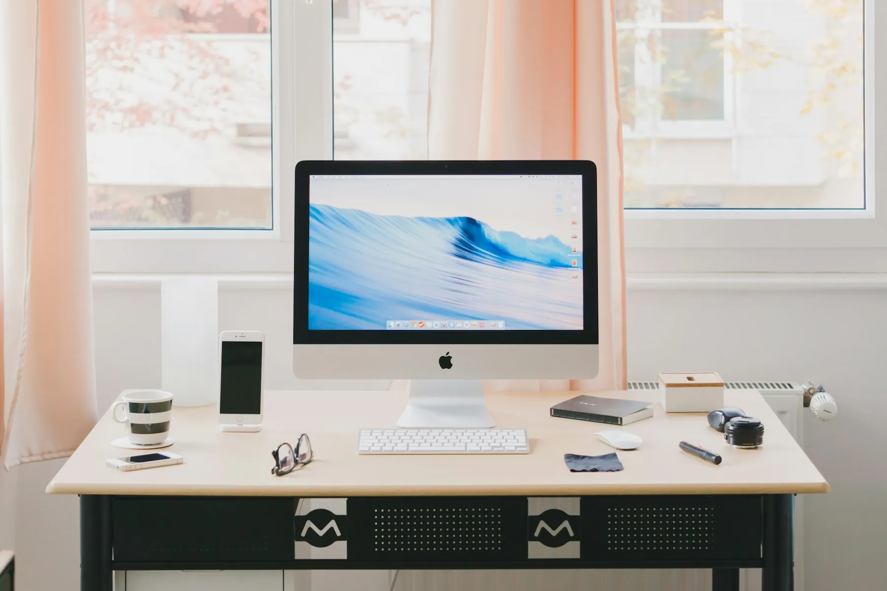 A minimal computer workstation on a clean desk